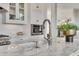 Close up of kitchen island featuring a marble countertop and stainless steel faucet at 26 Saturday Rd, Mount Pleasant, SC 29464