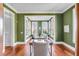 Inviting living room with an olive green color scheme and abundant natural light at 26 Saturday Rd, Mount Pleasant, SC 29464