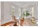 Cozy living room with ample natural light, featuring neutral tones and elegant furnishings at 26 Saturday Rd, Mount Pleasant, SC 29464