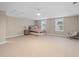 Spacious bedroom with neutral colors, carpet, and abundant natural light from two windows at 2648 Augustus St, Daniel Island, SC 29492