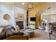 Cozy living room features a fireplace, bookshelves, and comfortable seating, perfect for relaxing at 29 Broad St # A C, Charleston, SC 29401
