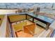 Rooftop access featuring a wooden staircase and glass skylight, offering views of the surrounding cityscape at 29 Broad St # A C, Charleston, SC 29401