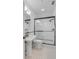 Modern bathroom featuring a black-framed shower and classic black and white tile at 309 N Civitas St, Mount Pleasant, SC 29464