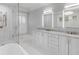 Bathroom featuring a large shower, soaking tub, dual sink vanity, and ample storage at 309 N Civitas St, Mount Pleasant, SC 29464