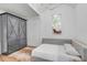 Cozy bedroom with a built-in bed, gray wardrobe, and stylish fixtures at 309 N Civitas St, Mount Pleasant, SC 29464