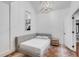 Comfortable bedroom featuring built-in bed and light wood accents at 309 N Civitas St, Mount Pleasant, SC 29464