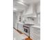 Kitchen features stainless steel appliances, white cabinetry, and stone countertops at 309 N Civitas St, Mount Pleasant, SC 29464
