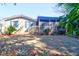 Beautiful backyard featuring a screened in patio area and lush greenery at 339 Cabell St, Charleston, SC 29407