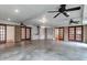 Expansive finished basement with multiple ceiling fans, built-in shelving, and plenty of space at 339 Cabell St, Charleston, SC 29407