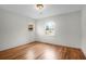 Bedroom with hardwood floors and two windows allowing for natural light, offers a cozy and inviting atmosphere at 339 Cabell St, Charleston, SC 29407