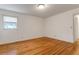 A sunny bedroom with hardwood floors, natural lighting, and a window with pleasant outdoor views at 339 Cabell St, Charleston, SC 29407
