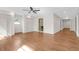 Spacious bedroom with a ceiling fan, hardwood floors, and ample closet space, providing comfort and functionality at 339 Cabell St, Charleston, SC 29407