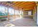 Inviting screened-in porch with ceiling fans, offering a comfortable space for outdoor entertainment at 339 Cabell St, Charleston, SC 29407