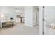 Upstairs hallway with desk, leading to well-lit bedrooms and bathrooms at 360 Citrus Dr, Summerville, SC 29486