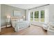 Serene main bedroom with large windows, soft lighting, and calming decor at 360 Citrus Dr, Summerville, SC 29486