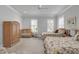 Charming bedroom features two beds, a crib, and a large wooden armoire at 4000 Cameron Blvd, Isle of Palms, SC 29451