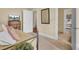Inviting bedroom features a twin bed, dresser, and multiple entryways at 4000 Cameron Blvd, Isle of Palms, SC 29451