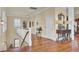 Upstairs hallway showing natural light and beautiful hardwood floors at 4000 Cameron Blvd, Isle of Palms, SC 29451