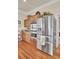 Kitchen featuring modern stainless steel refrigerator and built-in microwave and oven at 4000 Cameron Blvd, Isle of Palms, SC 29451