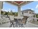 Outdoor dining and seating area has beautiful views and plenty of space for entertaining at 4000 Cameron Blvd, Isle of Palms, SC 29451