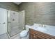 Tastefully decorated bathroom with granite counters, modern fixtures, and glass enclosed shower at 4140 Club Course Dr, North Charleston, SC 29420