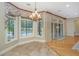 Charming dining area with views of the backyard pool and patio at 4140 Club Course Dr, North Charleston, SC 29420