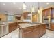 Well-equipped kitchen with stainless steel appliances and center island at 4140 Club Course Dr, North Charleston, SC 29420