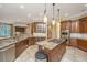 Gourmet kitchen with granite countertops, stainless steel appliances, and large center island at 4140 Club Course Dr, North Charleston, SC 29420