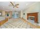 Bright living room with a fireplace and access to the pool at 4140 Club Course Dr, North Charleston, SC 29420
