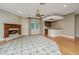 Cozy living room features a fireplace and a convenient wet bar for entertaining at 4140 Club Course Dr, North Charleston, SC 29420