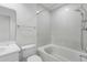 Cozy bathroom with shower and bath combo and tiled walls at 4850 Habersham Ln, Summerville, SC 29485