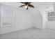 Bright bedroom features neutral carpet, a ceiling fan, and lots of natural light at 4850 Habersham Ln, Summerville, SC 29485