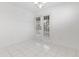 Dining area features tile floor and a double glass paneled door at 4850 Habersham Ln, Summerville, SC 29485