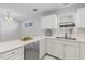 Kitchen featuring stainless steel appliances, white cabinets and tile floors at 4850 Habersham Ln, Summerville, SC 29485