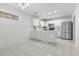 Large kitchen with stainless appliances, white cabinets, and tile flooring at 4850 Habersham Ln, Summerville, SC 29485
