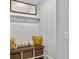 Inviting entryway with a bench, storage baskets, and decorative pillows at 502 Pontoon Rd, Huger, SC 29450