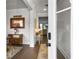 Open foyer with hardwood floors, leading to a view of dining and living room areas at 502 Pontoon Rd, Huger, SC 29450