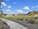 Community playground with various slides, swings, and play areas for children at 502 Pontoon Rd, Huger, SC 29450