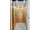 Interior of elevator with wood paneling, showing accessibility feature at 511 W Ashley Ave, Folly Beach, SC 29439