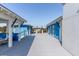 Exterior view of blue building with rooftop patio at 511 W Ashley Ave, Folly Beach, SC 29439