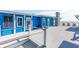 Blue house exterior with a rooftop patio overlooking the ocean at 511 W Ashley Ave, Folly Beach, SC 29439