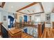 Spacious foyer featuring hardwood floors, decorative railings, and an open floor plan at 511 W Ashley Ave, Folly Beach, SC 29439