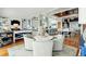 Spacious open living room with views into kitchen and dining areas at 511 W Ashley Ave, Folly Beach, SC 29439