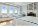 Spacious main bedroom features fireplace, window seating, and ocean views at 511 W Ashley Ave, Folly Beach, SC 29439