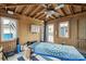 Interior view of room with wood paneled walls and ceiling, and massage table at 511 W Ashley Ave, Folly Beach, SC 29439