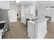 Modern kitchen features stainless steel appliances, white cabinetry, and an open design at 5509 Copper Trce, North Charleston, SC 29418