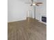 Spacious living area features a fireplace, vaulted ceiling with fan, and plenty of natural light at 5509 Copper Trce, North Charleston, SC 29418