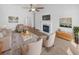 Bright and airy living room boasts a fireplace, vaulted ceiling with fan, and neutral decor at 5509 Copper Trce, North Charleston, SC 29418