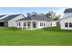 Expansive backyard with a covered patio, perfect for outdoor entertaining at 642 Cottage Landing Dr, Summerville, SC 29485