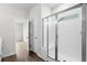 Bright bathroom with a glass-enclosed shower, white subway tile, and a built-in bench at 642 Cottage Landing Dr, Summerville, SC 29485